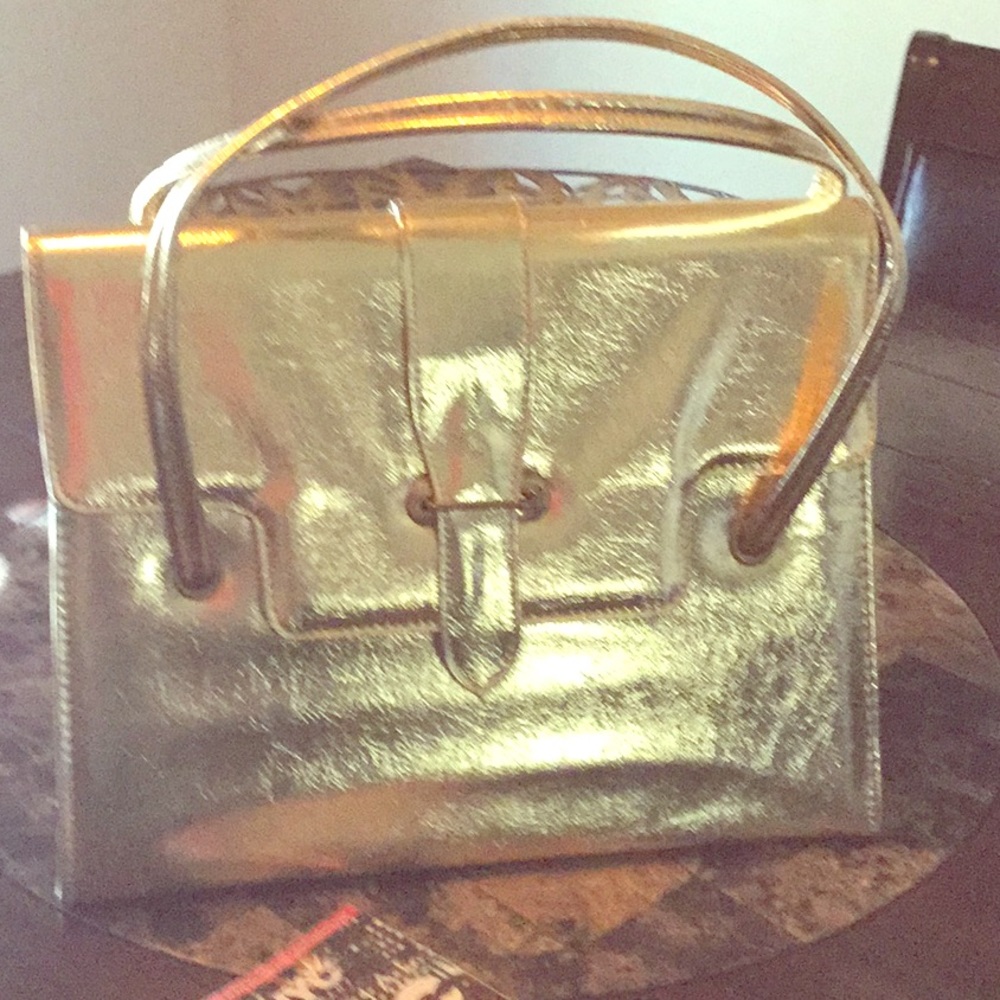 Vintage gold handbag from the ‘60’s! Trending now!